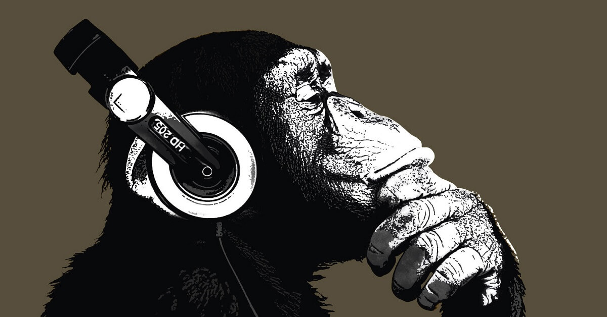 Chimp listening to music